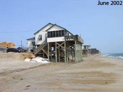 Figure  12.6  Retreat.  (a)  June  2002. Houses along the shore in Kitty Hawk,  North  Carolina.  Geotextile  sand  bags  protect the septic tank buried  in  the  dunes. (b) October 2002. (c) June 2003 [Photo source:  James G. Titus, used with permission].